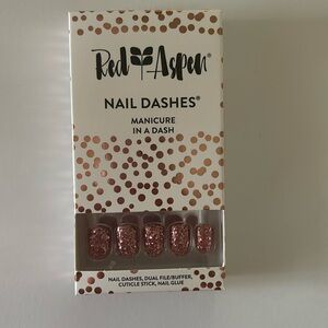 Red aspen nail dashes fake nails